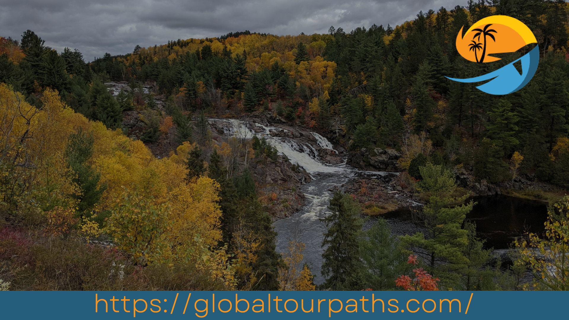 Onaping Falls cascading down surrounding autumn foliage west of Sudbury