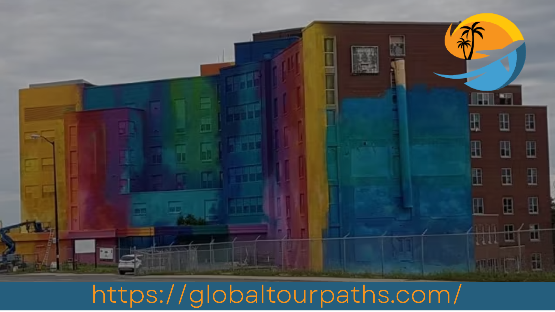 Colorful mural on an abandoned Sudbury hospital for Up Here Festival